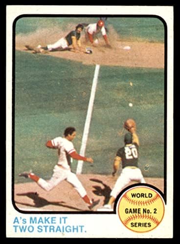 1973 Topps 204 1972 World Series - Igra 2 - A's Make It Two Straight Johnny Bench/Tony Perez/Mike Hegan/Dick Green Oakland/Cincinnati